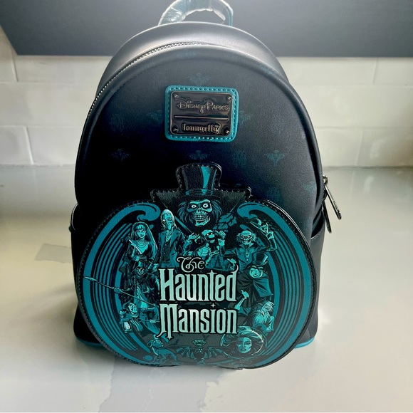 Disney Handbags - Disney Glow-In-The-Dark Haunted Mansion Loungefly Backpack